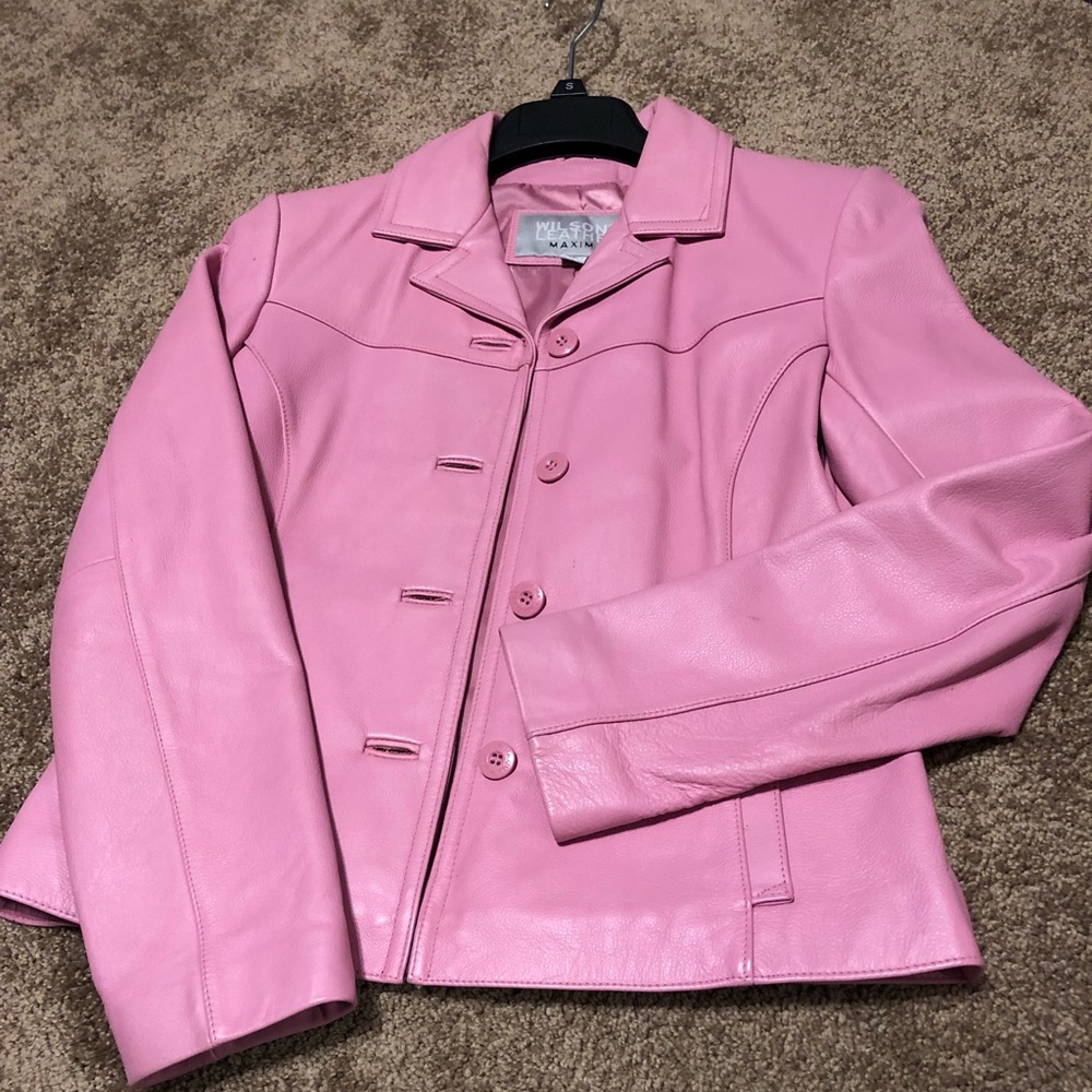 Wilson’s pink leather jacket and purse
